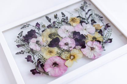 wedding bouquet preserved in a white modern frame 